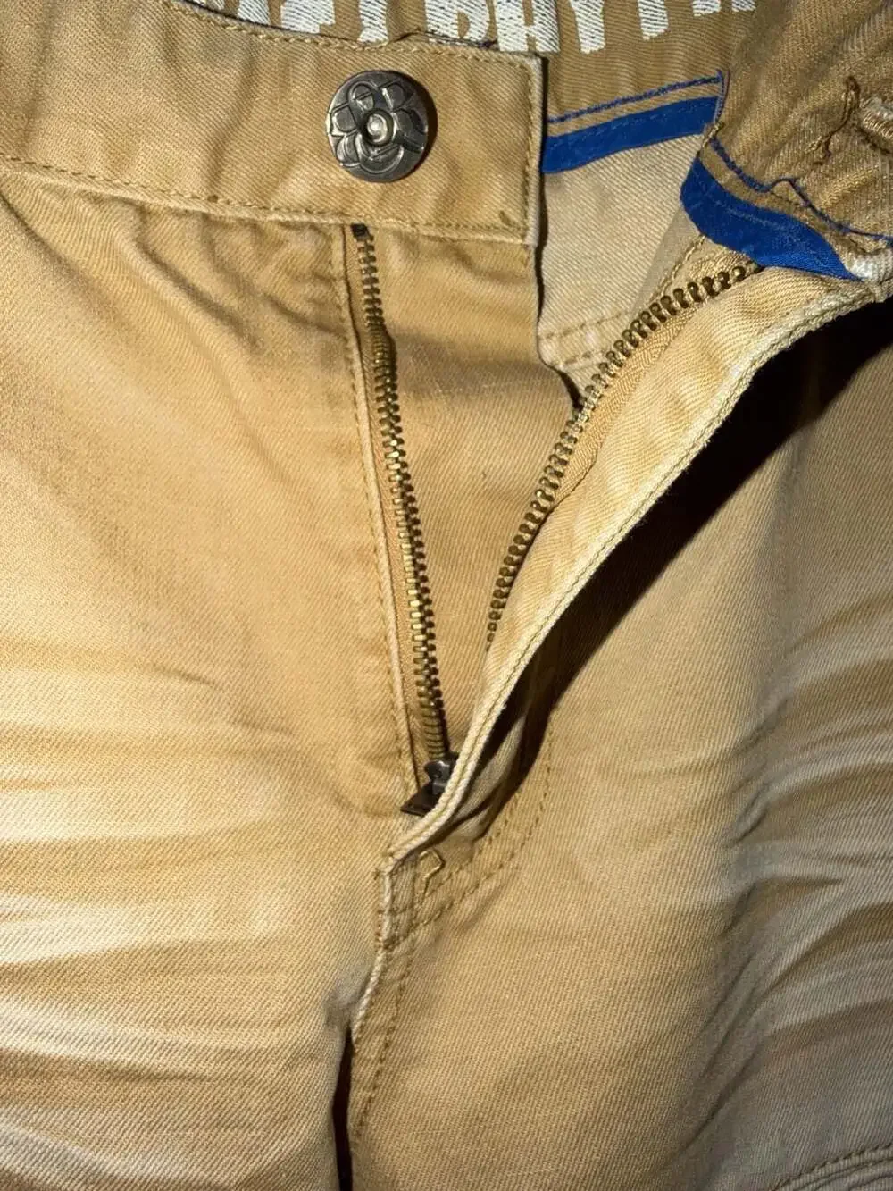 Beat & Rhythm Biker Denim Shorts Khaki with Pleated Panels and Zipper Accents